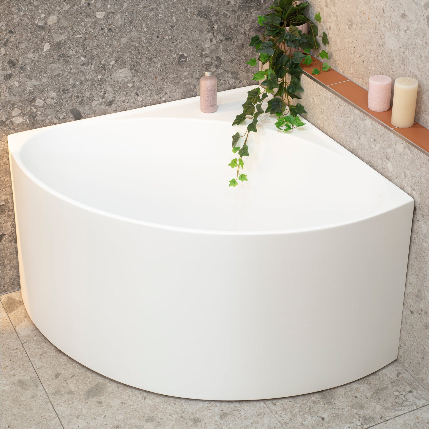 Angie Corner Fit Japanese Soaking Bathtub in matte white finish, placed in a modern bathroom corner.